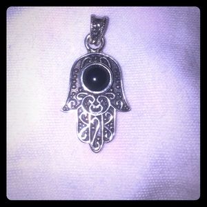Sterling Silver and Black Onyx Hamsa pendant.